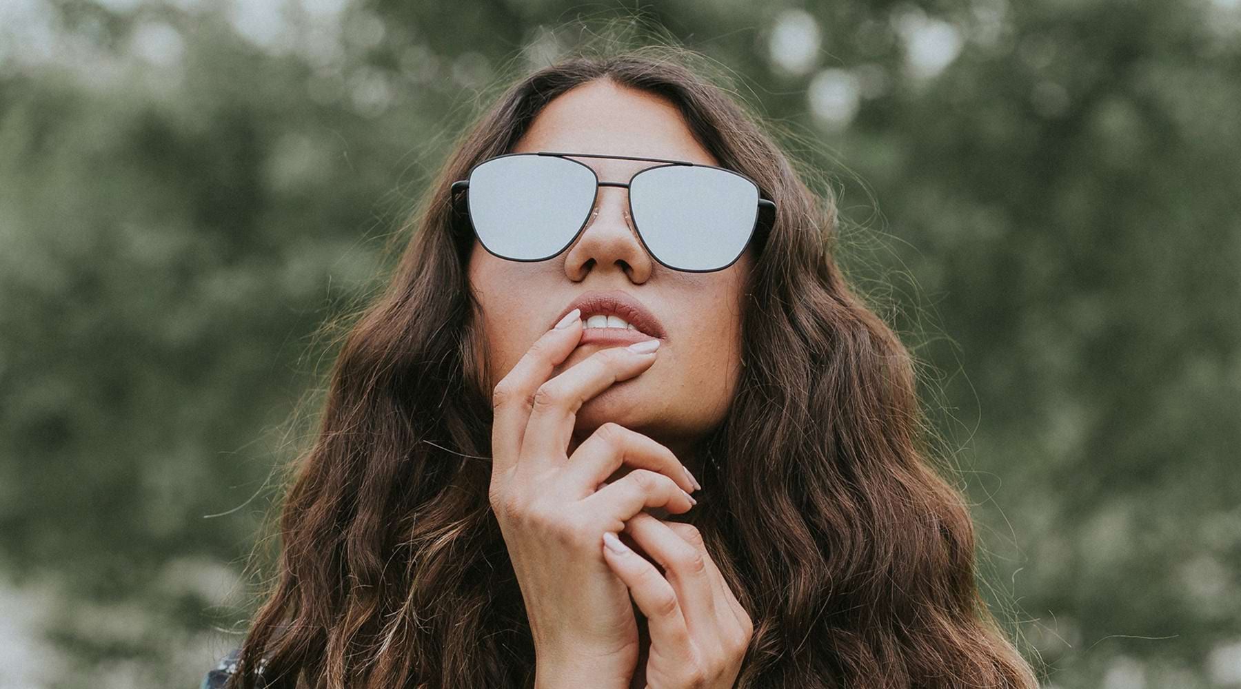 Woman chilling in the sun enjoying nature Woman chilling in the sun enjoying nature