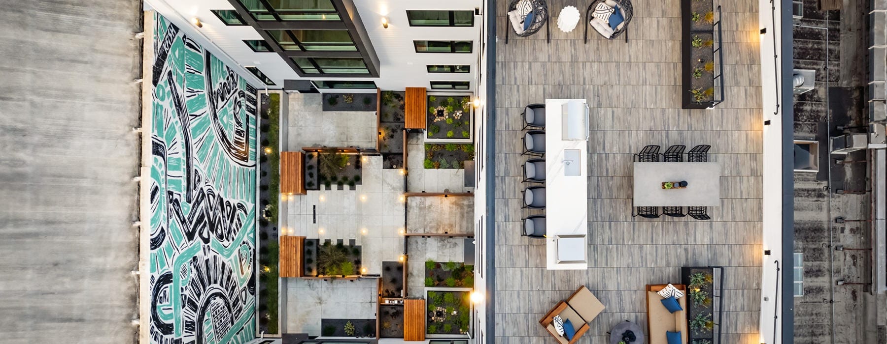 Aerial view of rooftop lounge and art spaces 